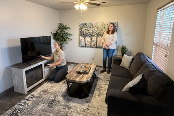 staff-checking-the-amenities-inside-the-cabin